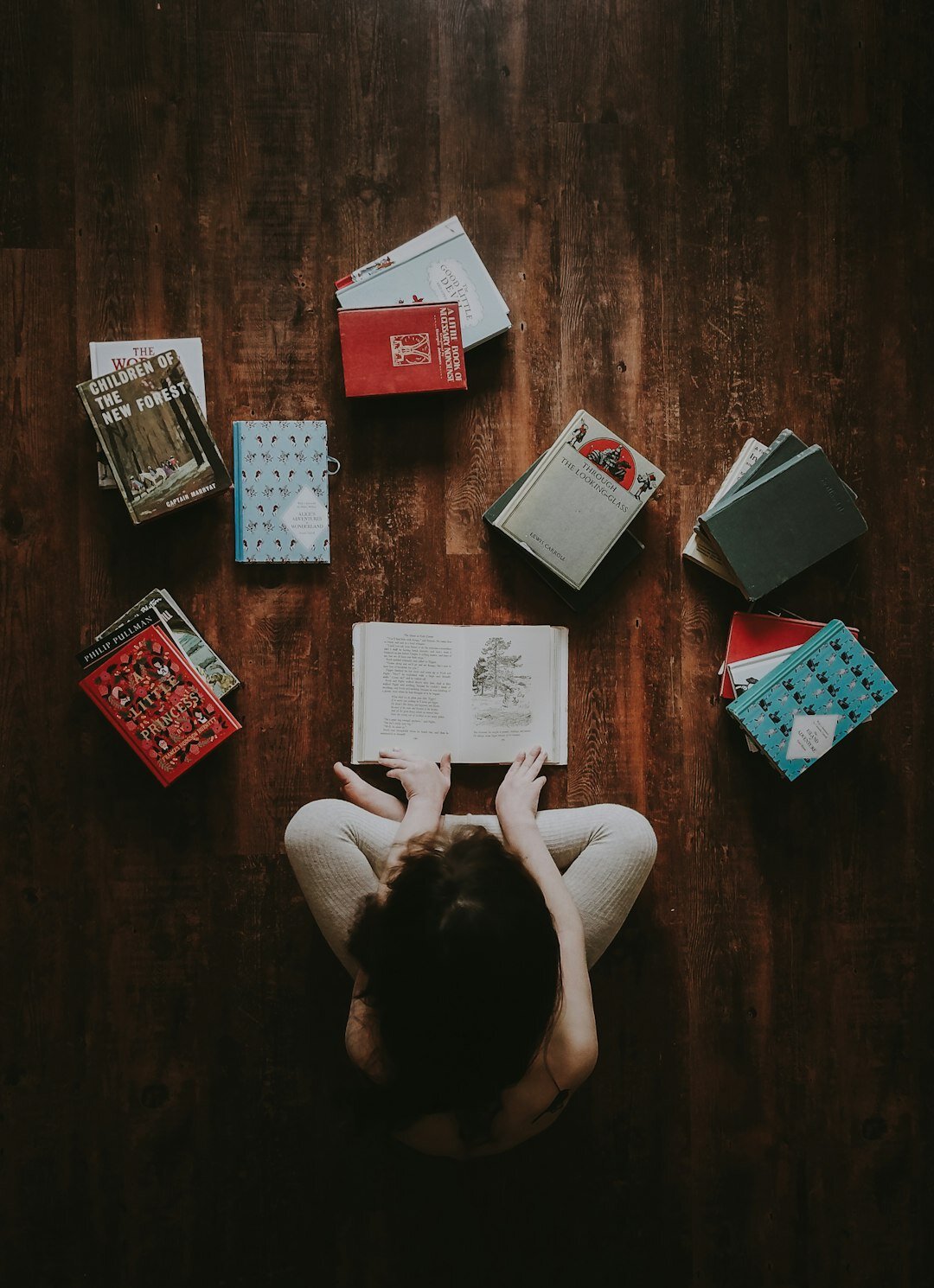 person reading mystery book